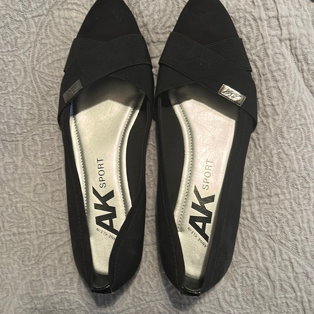 Never worn Anne Klein flats.